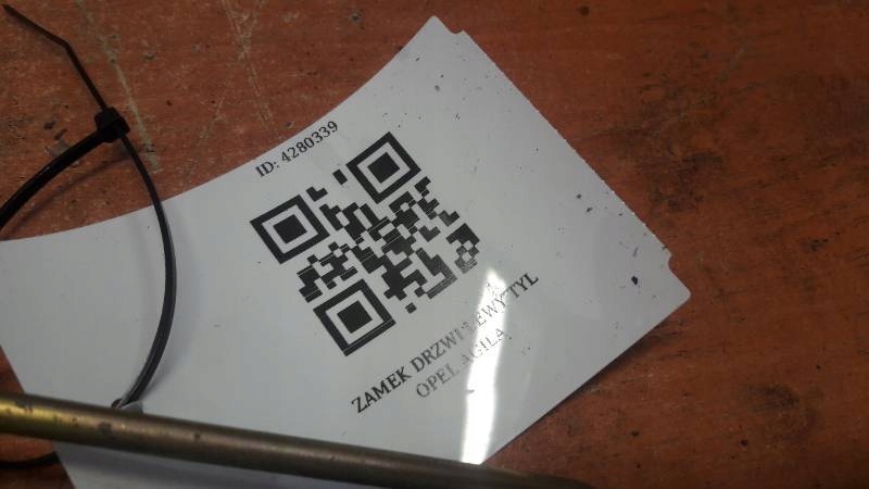 Zamek drzwi lewy tyl opel agila