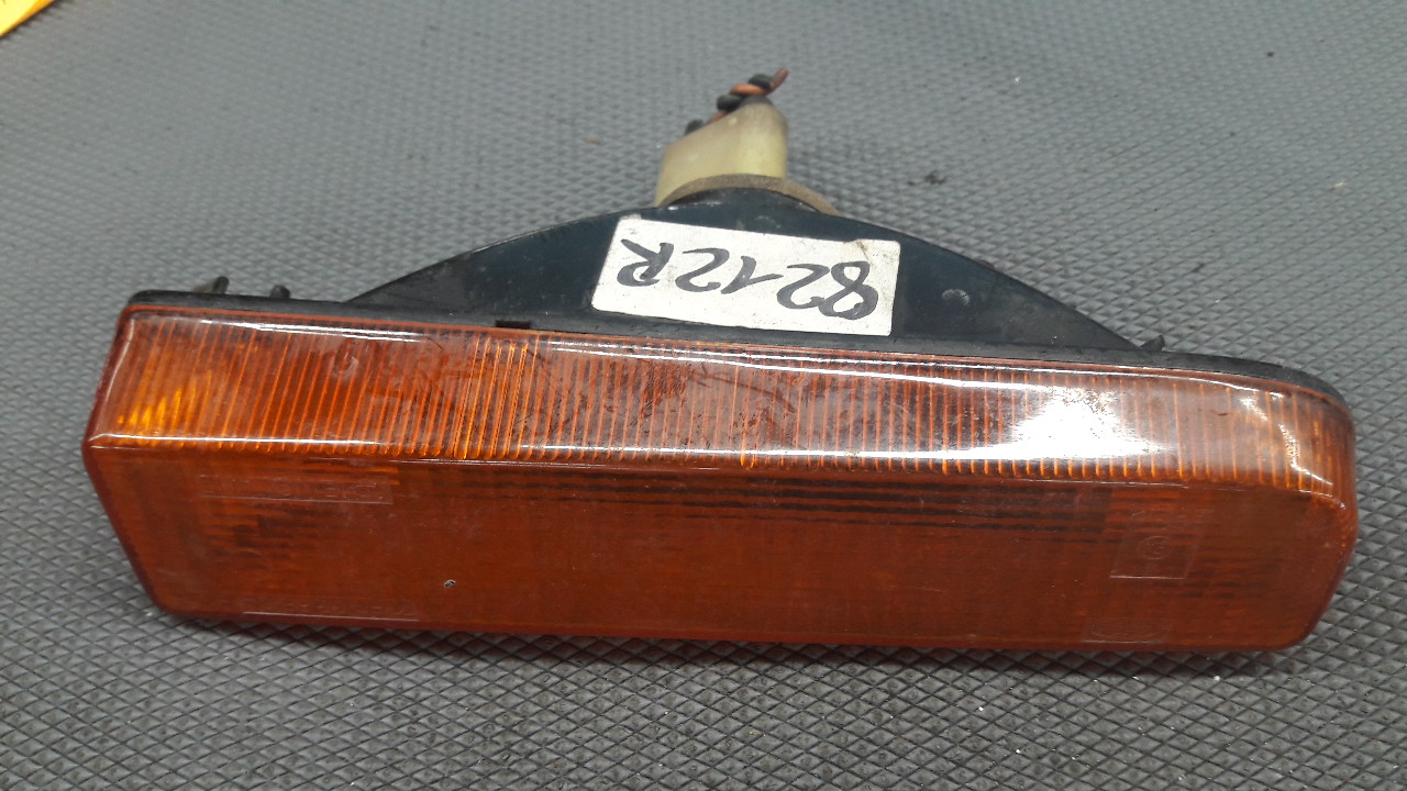 77FG13368CA kierunkowskaz lewy FORD FIESTA MK1 78r