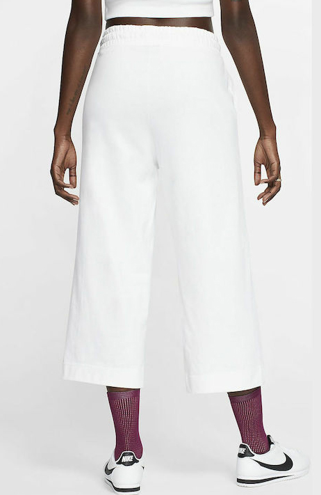 Białe spodnie dresowe damskie Nike CJ3748-100 S 3/4 bok z wysokim stanem