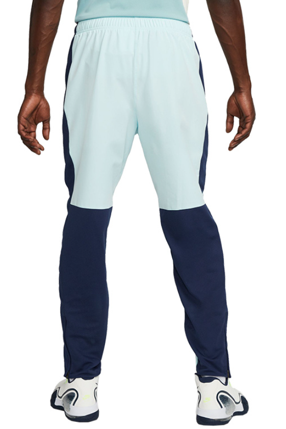 Jasnoniebieskie spodnie męskie Nike Court Advantage DA4376-474 M bok z zamkiem na nogawce