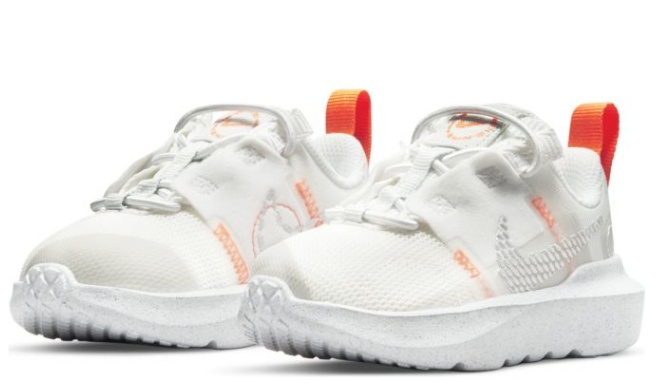 Białe dziecięce sneakersy Nike Crater Impact DB3553100 r. 26 z pomarańczowymi elementami