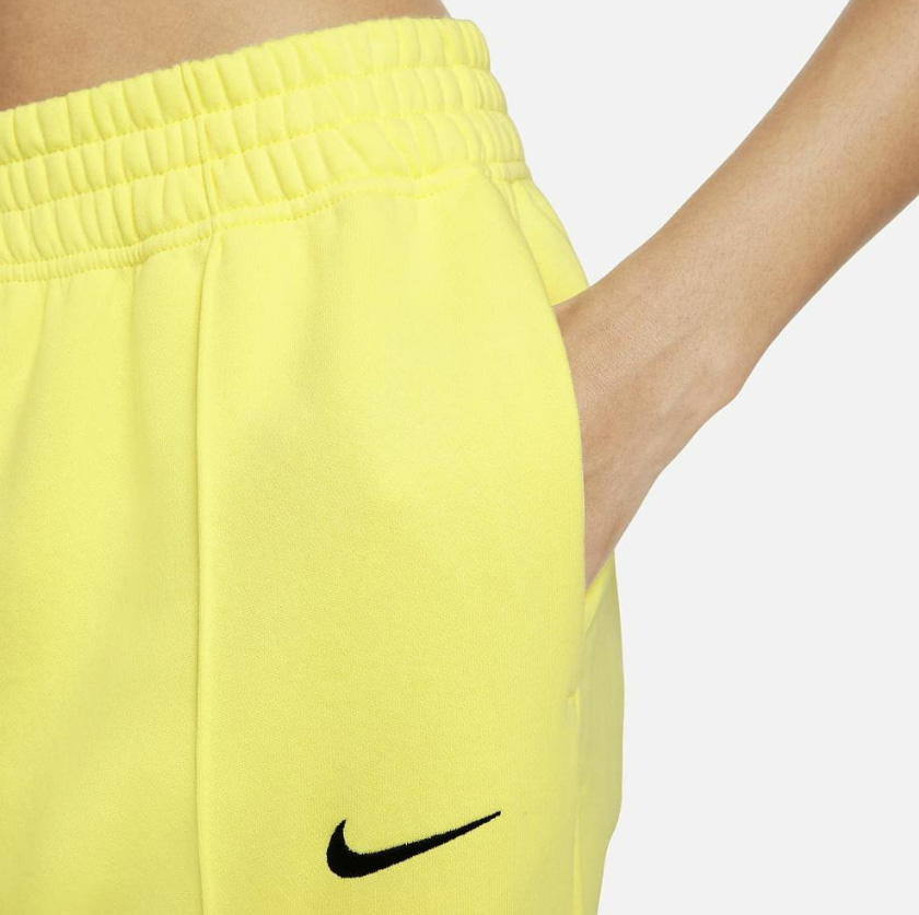Żółte spodnie dresowe damskie Nike DQ0388-712 XL przód z logo Swoosh