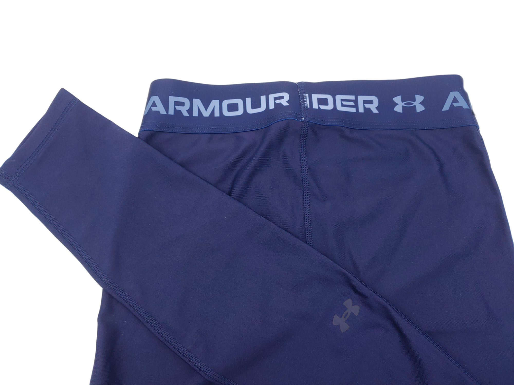 Damskie granatowe legginsy Under Armour HeatGear 1361043-410 SM przód z elastycznym pasem