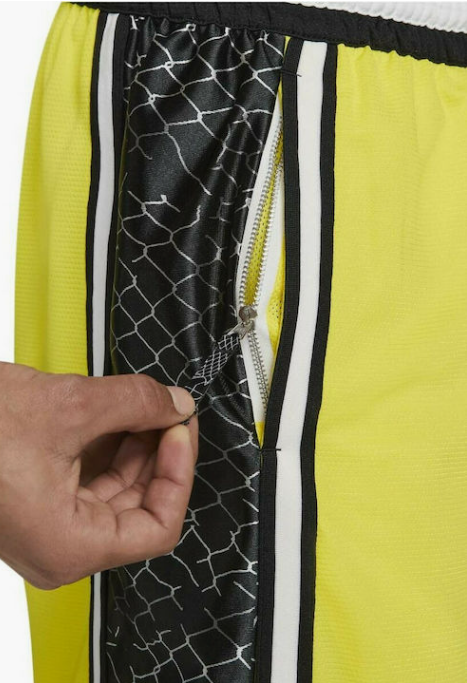 Żółte spodenki męskie Nike CV1897-731 S bok z siateczkowymi panelami