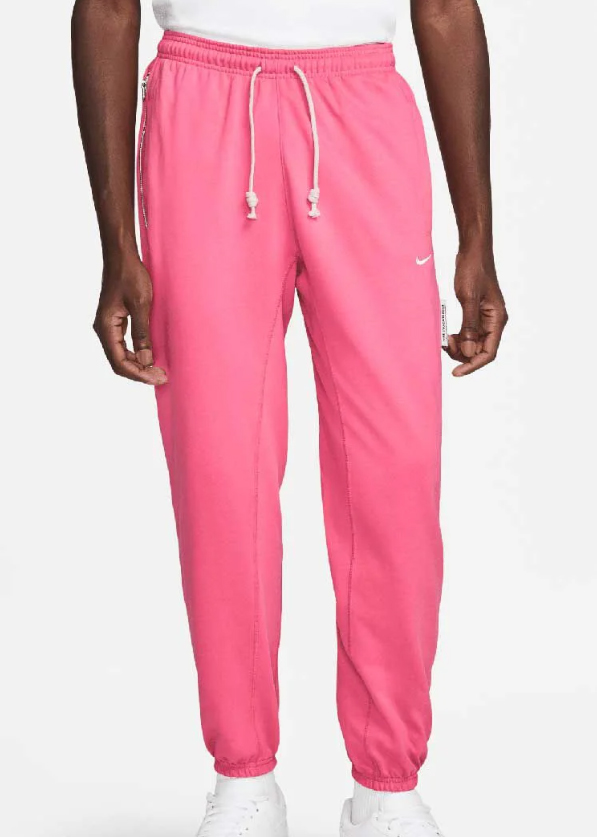 Różowe joggery męskie Nike Standard Issue CK6365684 L przód z logo Swoosh