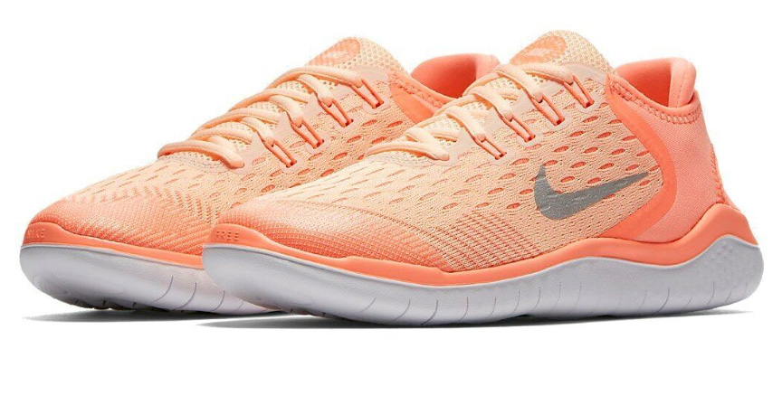 Pomarańczowe młodzieżowe sneakersy Nike Free RN 2018 GS AH3457-800 r. 36,5 bok z odblaskowym Swoosh