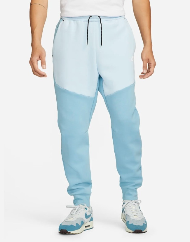 Niebieskie joggery męskie Nike Sportswear Tech Fleece CU4495-494 S przód z logo Nike