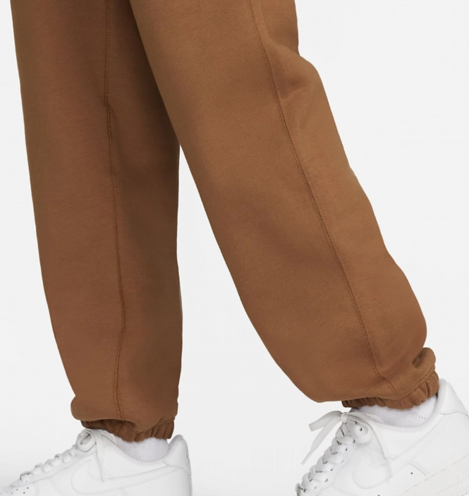 Spodnie dresowe damskie Nike Fleece Pant Loose Fit XXS brązowe bok