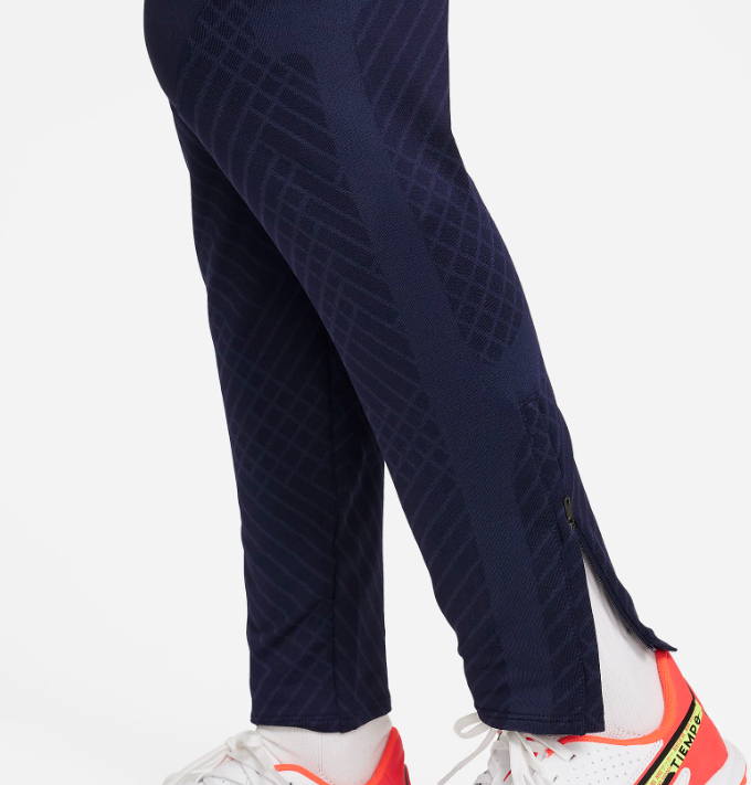 Niebieskie spodnie junior Nike Academy FC Barcelona Strike DJ8697-451 L z logo FC Barcelona