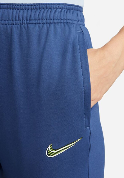 Damskie niebieskie spodnie Nike Strike Dri-FIT DH9159-411 M bok z kieszenią na suwak