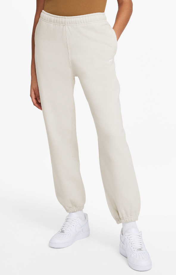 Spodnie dresowe damskie Nike Fleece Pant Loose Fit S beżowe przód