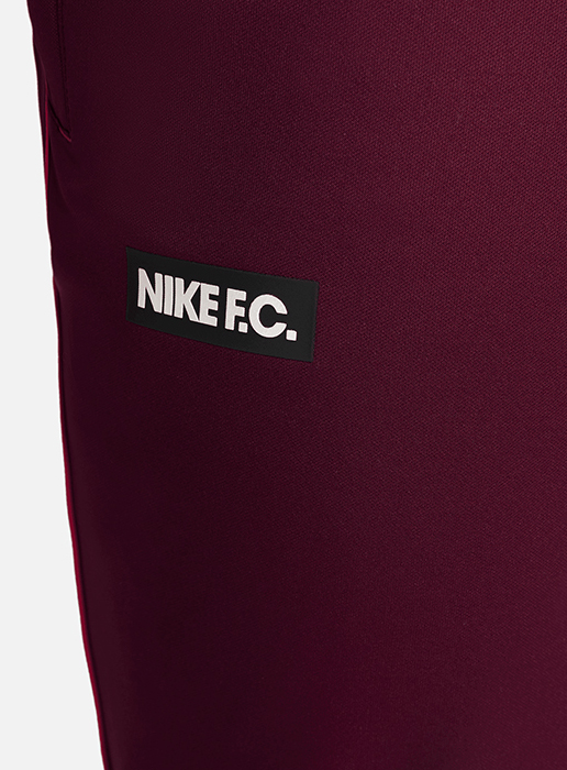 Bordowe spodnie dresowe męskie Nike F.C. Libero Dri-FIT DH9666-638 S bok z logo Nike