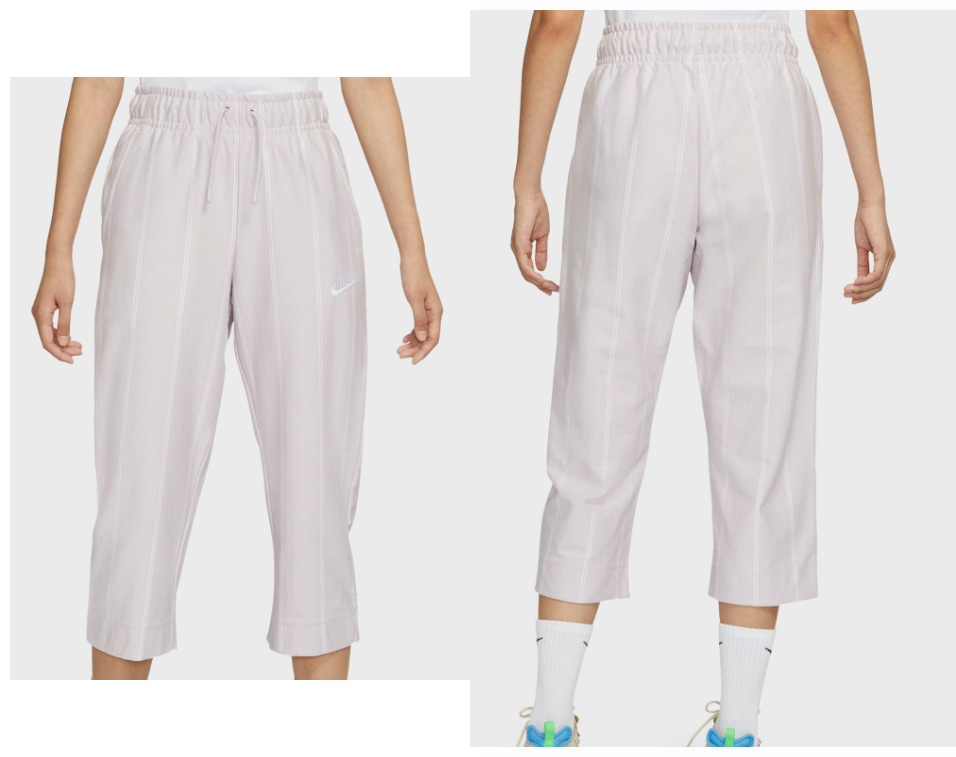 Beżowe spodnie Nike NSW DD5184-511 S przód z paskami Swoosh