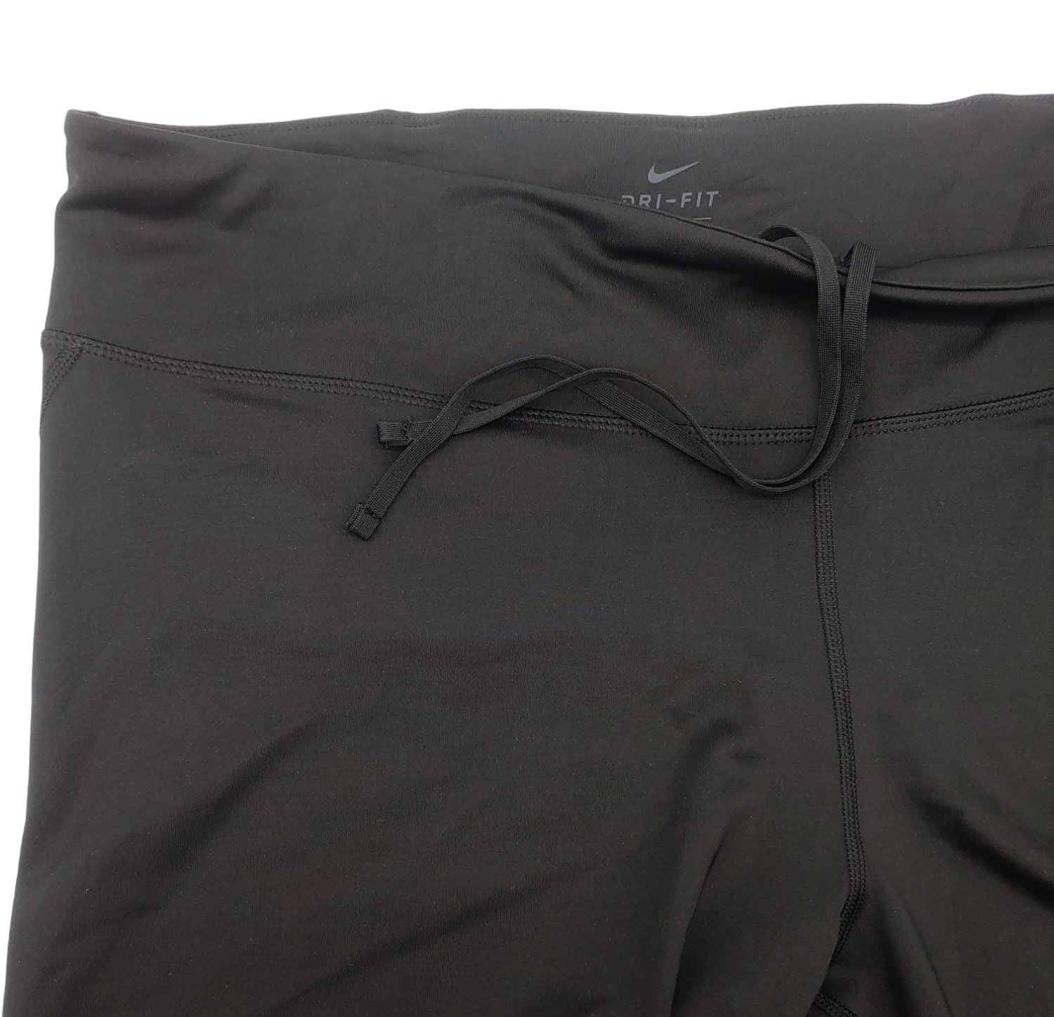 Damskie czarne legginsy Nike Swoosh DB4451-010 2X bok z siateczką na łydkach