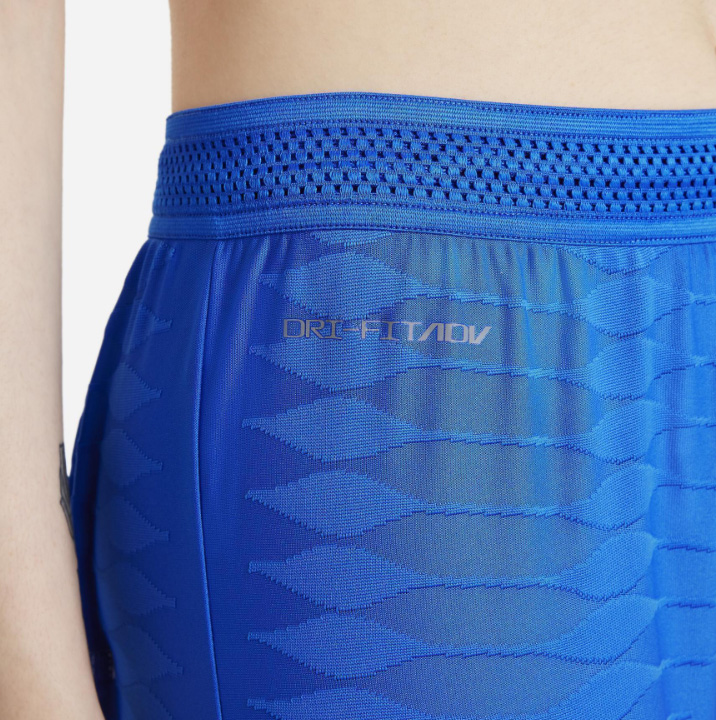 Niebieskie spodnie dresowe Nike FC Barcelona Dri-FIT DC0725-427 S przód z logo FC Barcelona