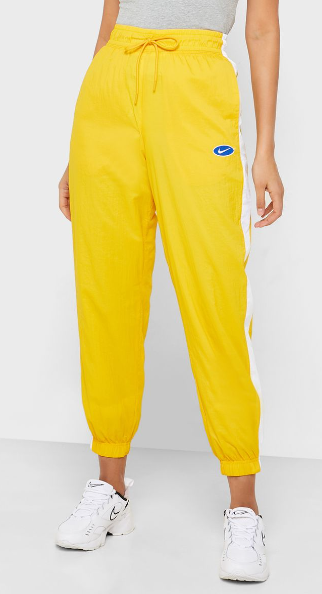 Damskie spodnie dresowe Nike NSW Swoosh BV3553-743 żółte tył