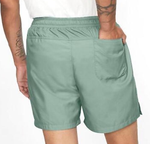 Zielone męskie spodenki Nike Sportswear Woven DR5678006 XL detal kieszeni i pasa