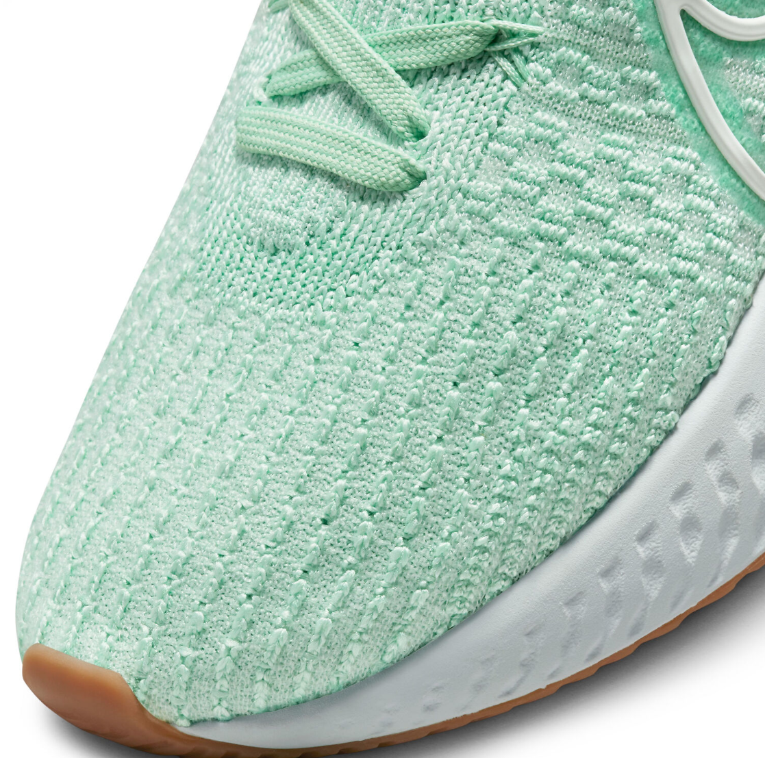 Boczny widok zielonych damskich butów Nike React Infinity Run Flyknit 3 DD3024-301 44,5 z pianką React