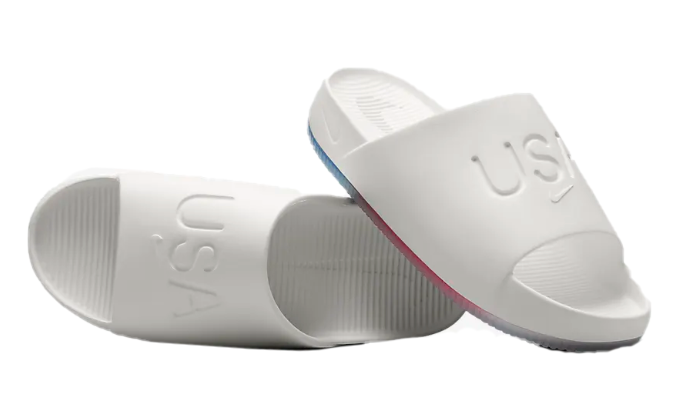 Białe damskie klapki Nike USA Calm Slide OLY FV5614-100 38 przód z ergonomiczną konstrukcją