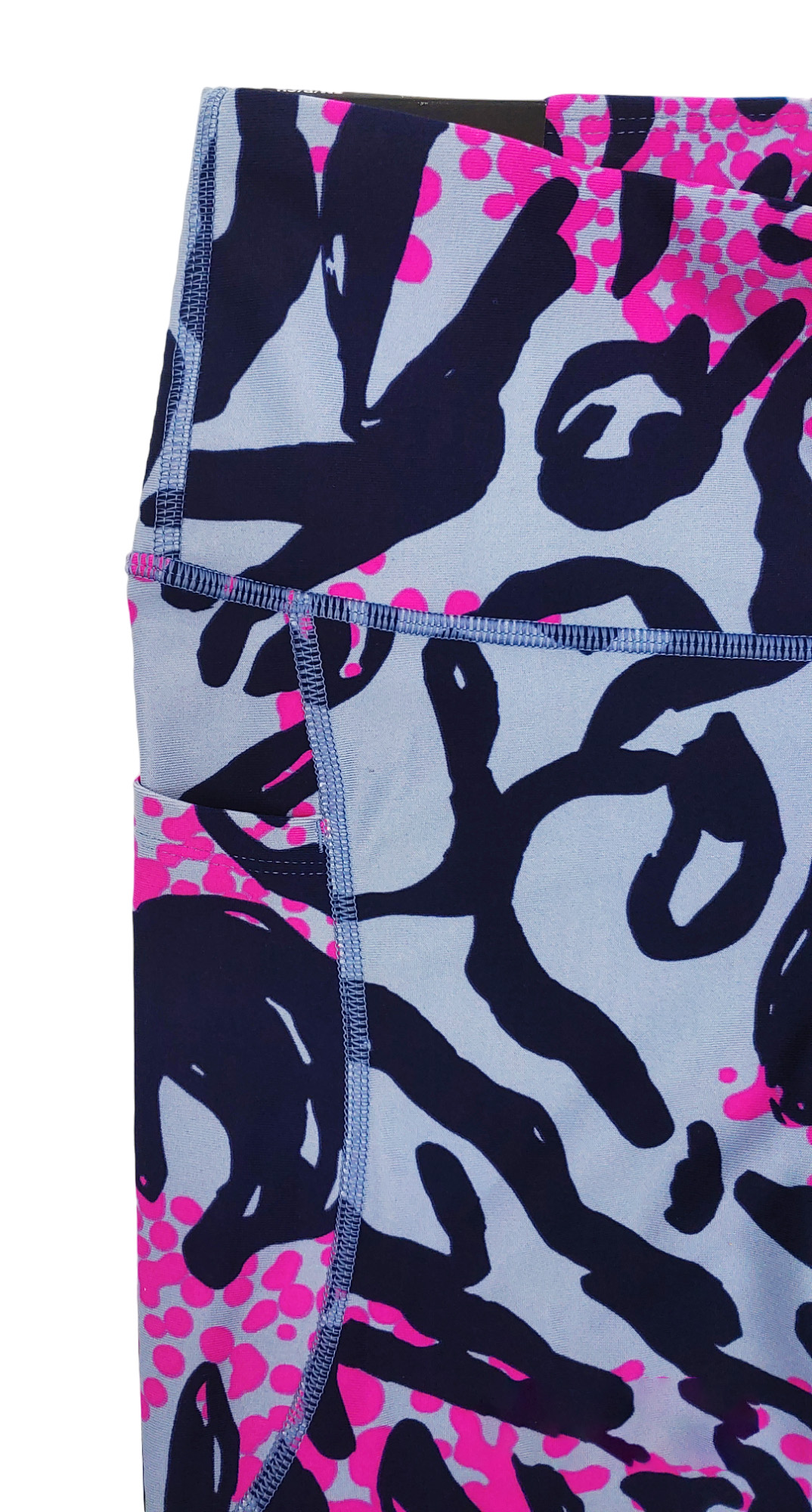 Multikolorowe legginsy damskie Under Armour HeatGear 7/8 SM bok z kieszenią