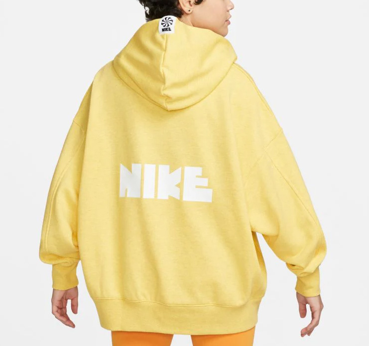 Żółta bluza damska Nike DM6775-709 M bok z logo