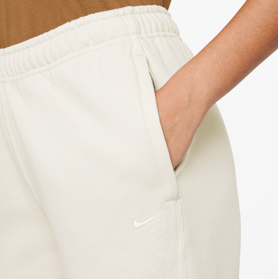 Spodnie dresowe damskie Nike Fleece Pant Loose Fit S beżowe bok