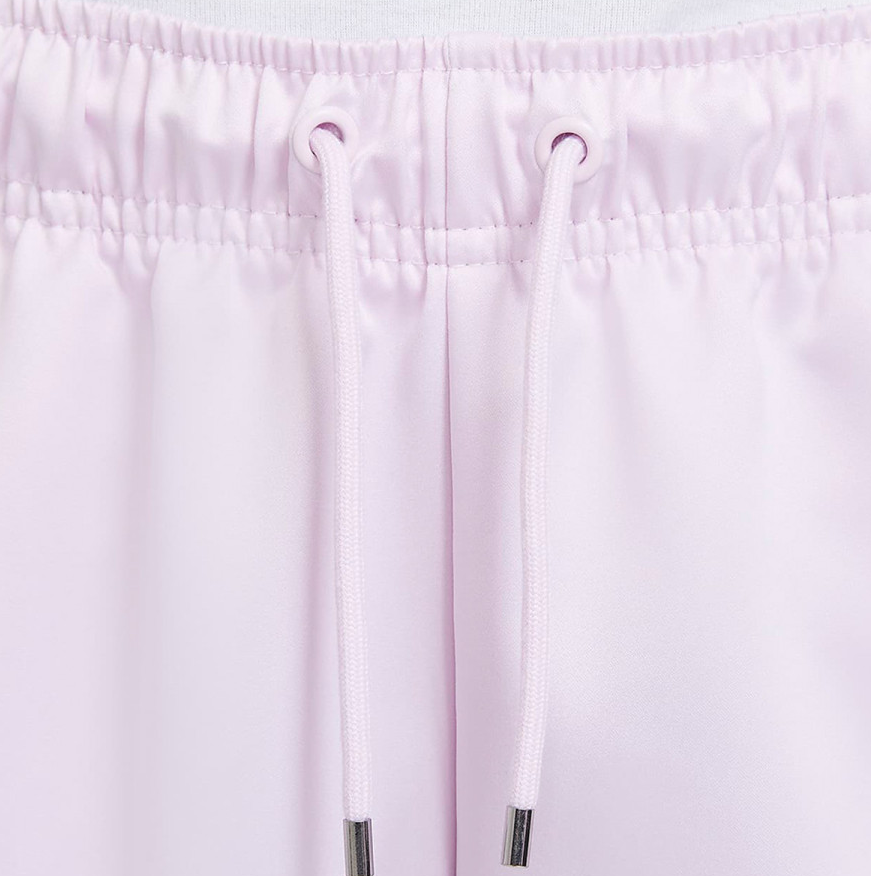 Boczny widok jasnoróżowych damskich spodni Nike Air Woven Lifestyle DD5425-695 XL ze ściągaczem