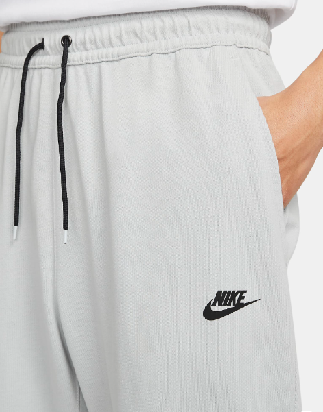 Szare spodnie dresowe męskie Nike Sportswear Open Hem DM6591063 XL bok z kieszenią z organizerem