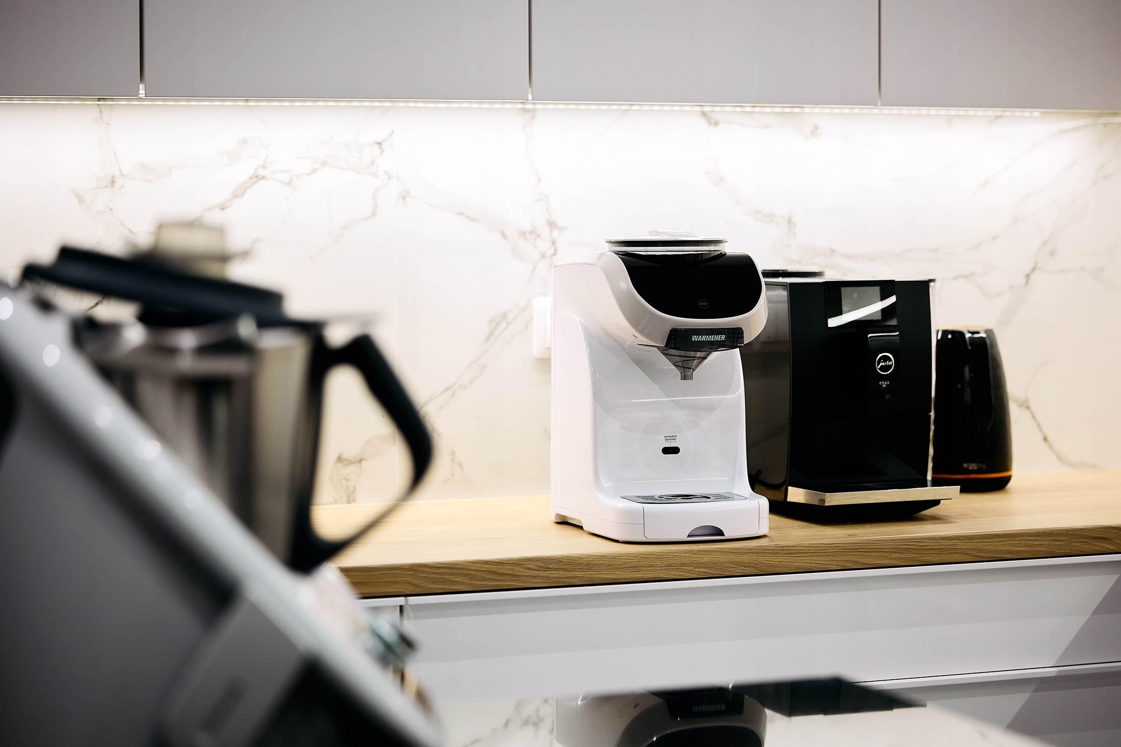 Funkcja ciepłej wody Warmener™ – przygotowanie herbatek i kaszek