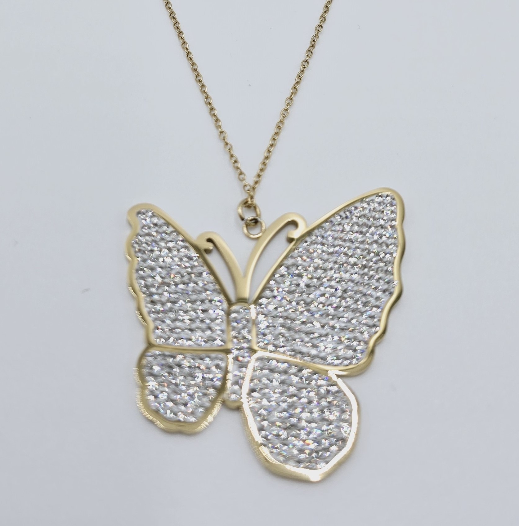 Piękny naszyjnik ze stali chirurgicznej Motyl białe cyrkonie