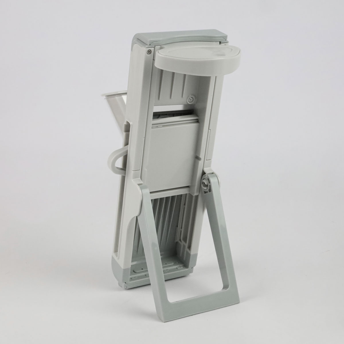 KRAJALNICA DO WARZYW Z POJEMNIKIEM I WYMIENNYMI NAKŁADKAMI TARKA