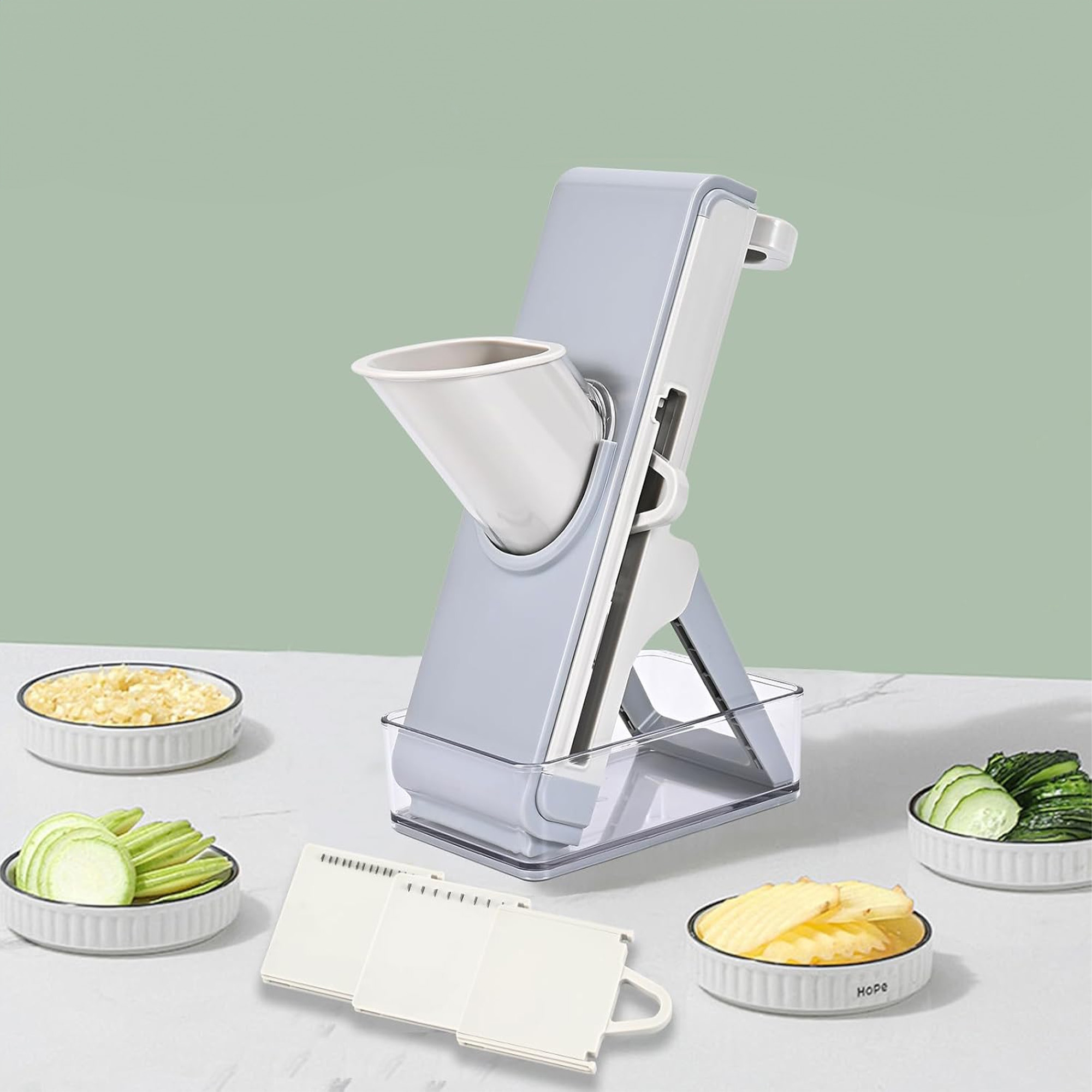 KRAJALNICA DO WARZYW Z POJEMNIKIEM I WYMIENNYMI NAKŁADKAMI TARKA