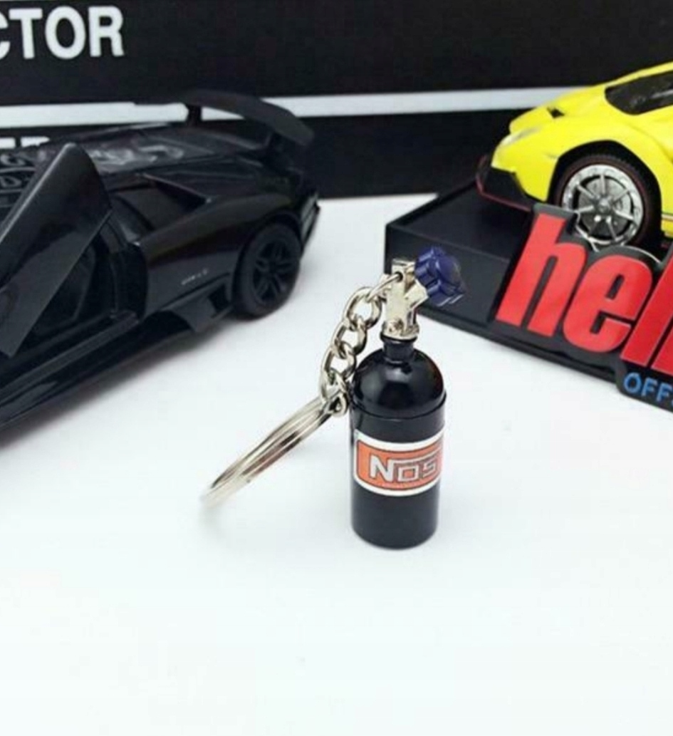 1 2122 Brelok pojemnik schowek NOS fan gadżet leki nitro