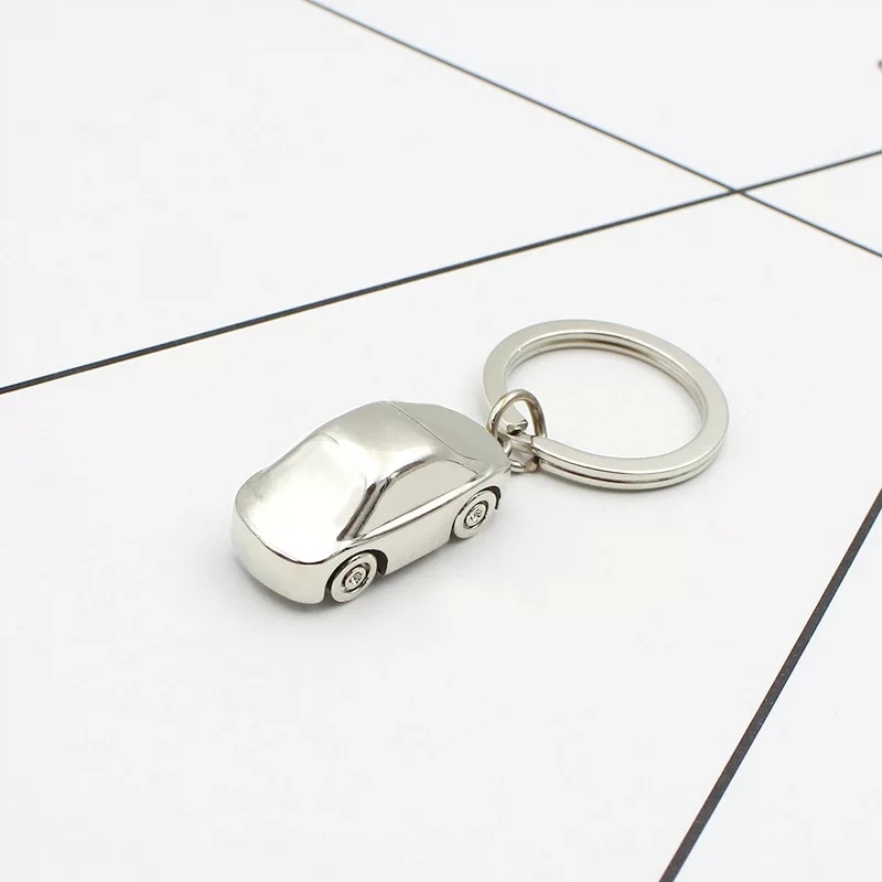 Brelok Samochodzik Cars Srebrny Tuning Ozdoba Breloczek do kluczy Zawieszka