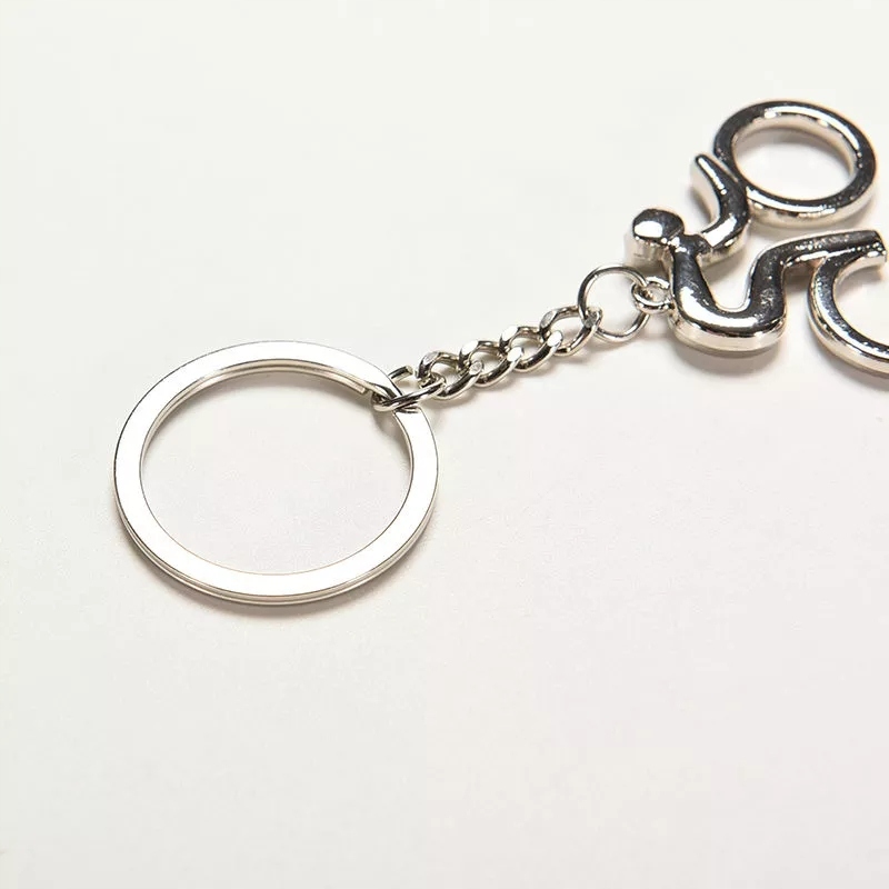 Breloczek do kluczy Rowerzysta Bicycle Rower Lance Armstrong Gadżet Maraton