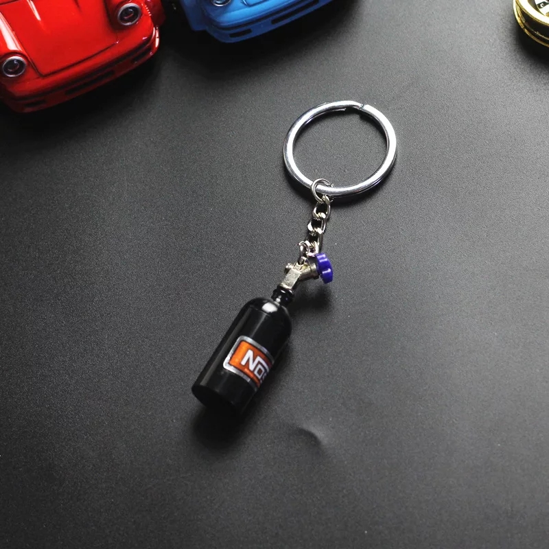 1 2122 Brelok pojemnik schowek NOS fan gadżet leki nitro