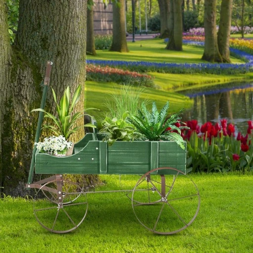 Wózek na kwiaty z metalowymi pojemnikami na zewnątrz regału na doniczki