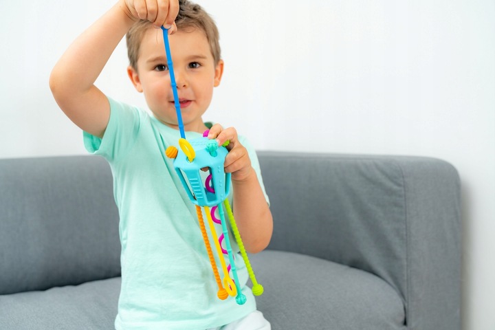 PRZECIĄGANIEC ZIPPEE ZABAWKA SENSORYCZNA prezent dla dzieci 18m+ MOBI