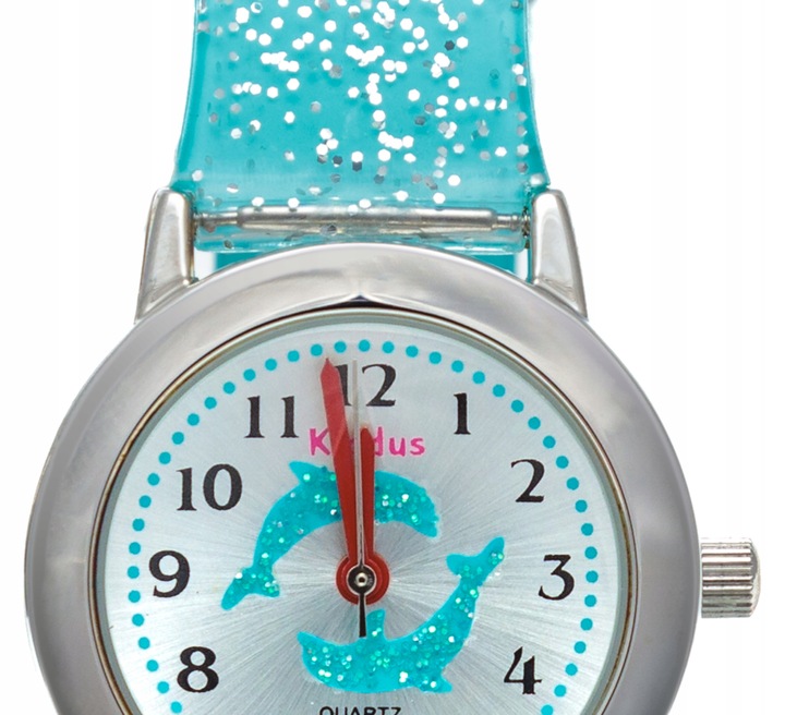 Girls' wrist watch with glitter. Includes exercises for learning the time.