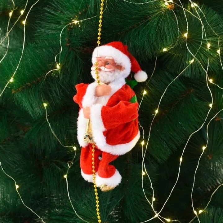 WSPINAJĄCY SIĘ MIKOŁAJ GRA ŚPIEWA ŚWIECI ŚWIĘTA NA PREZENT