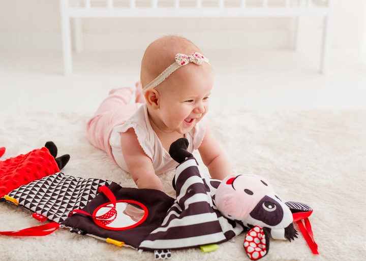 SENSORYCZNA KSIĄŻECZKA HARMONIJKA KRÓWKA 81044 BALIBAZOO