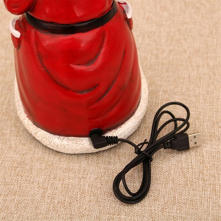 Figurka Święty Mikołaj z poruszającym się pociągiem światłami LED muzyką