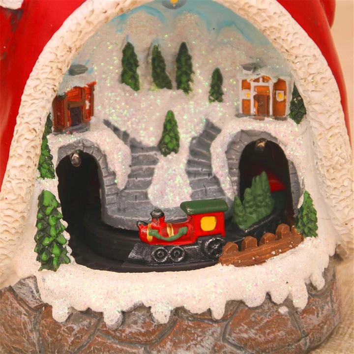 Figurka Święty Mikołaj z poruszającym się pociągiem światłami LED muzyką