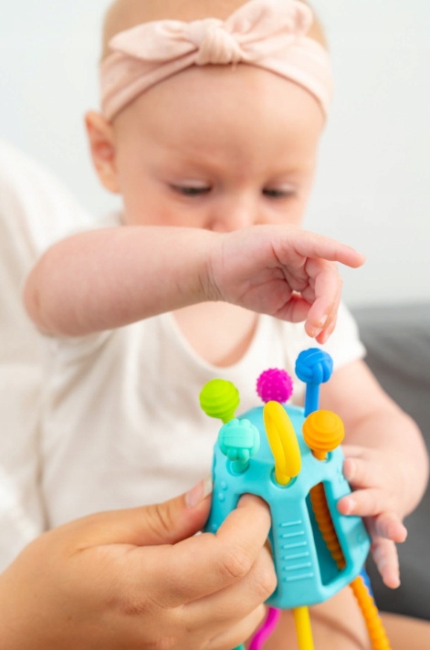 PRZECIĄGANIEC ZIPPEE ZABAWKA SENSORYCZNA prezent dla dzieci 18m+ MOBI