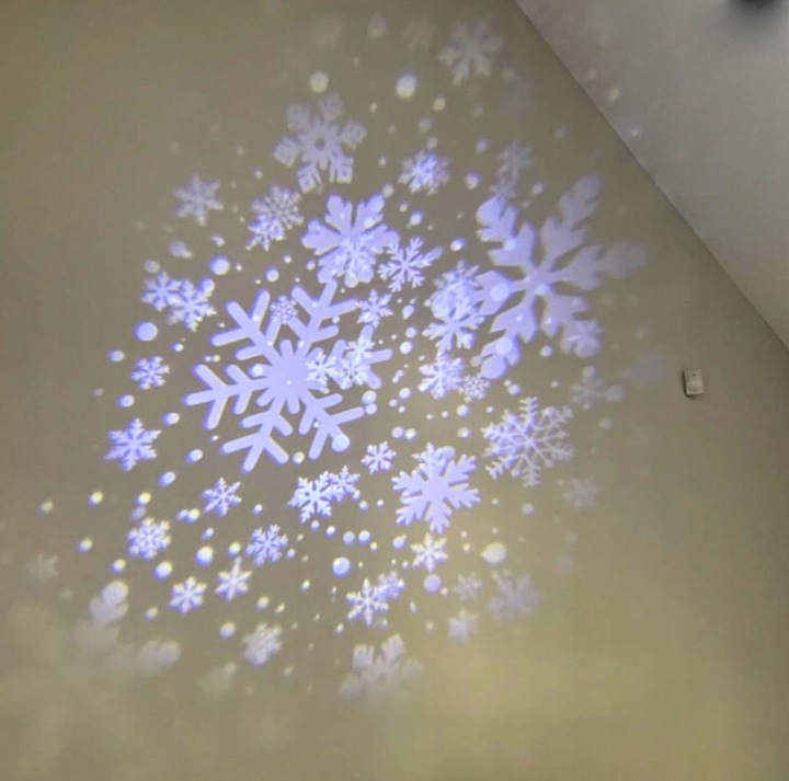 ŚWIĄTECZNY PROJEKTOR LED NA DOM ZEWNĄTRZ PŁATKI ŚNIEGU RZUTNIK NOWOŚĆ 2024