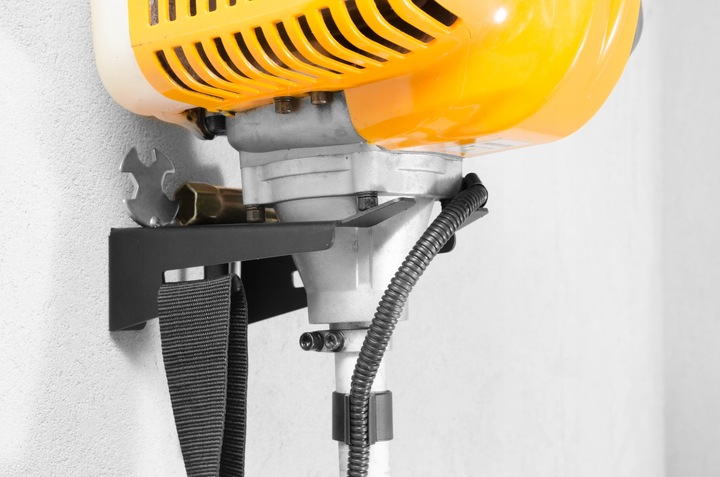 Wieszak uchwyt na kosę kosiarkę spalinową MARKOWY