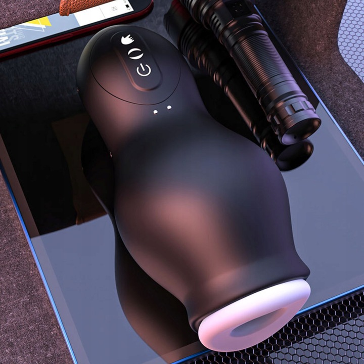 AUTOMATYCZNY MASTURBATOR MĘSKI SSĄCO WIBRUJĄCY DLA MĘŻCZYZN POSUWISTY FILKU