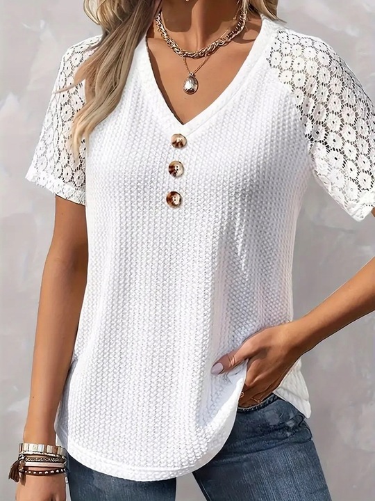 Stylowa bluzka ażurowa z krótkim rękawem o klasycznym kroju sweterek