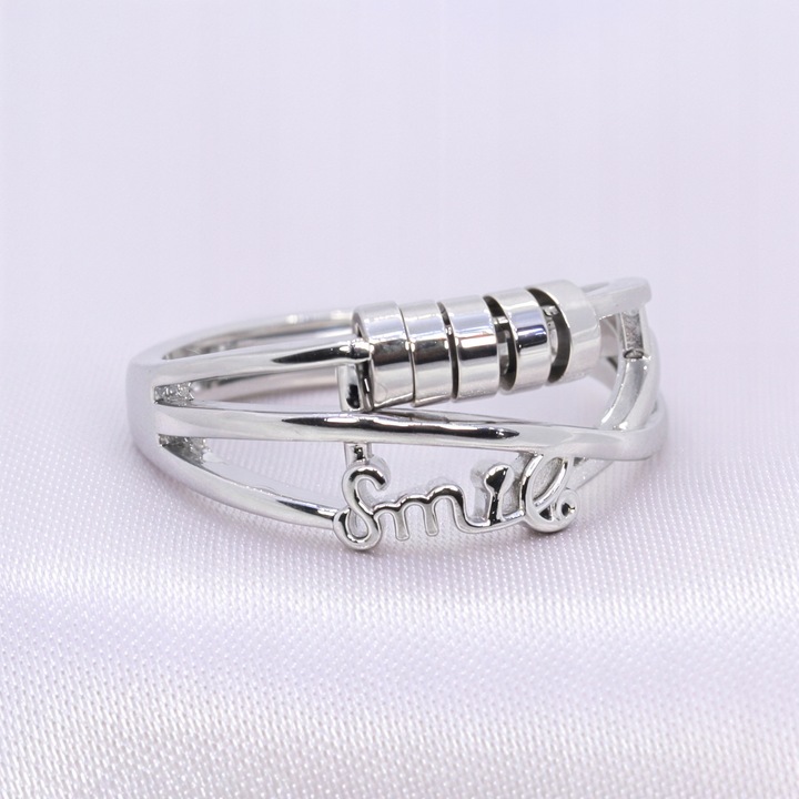 SREBRNY PIERŚCIONEK SMILE antystresowy stal chirurgiczna ruchome krążki