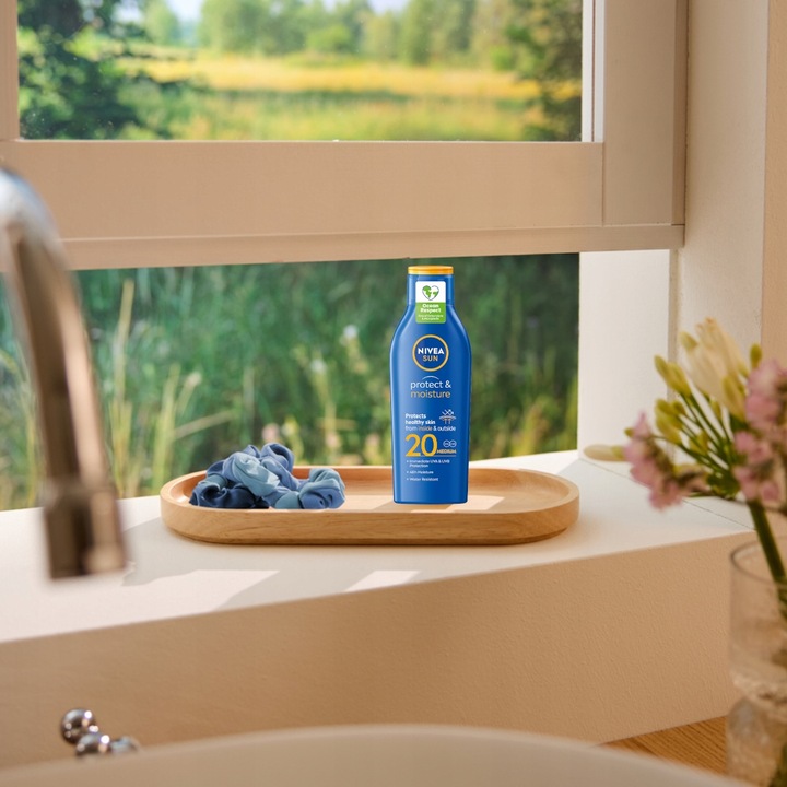 NIVEA SUN Protect & Moisture Balsam do opalania SPF 20, 200 ml